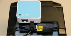 L'adaptateur du Star WiFi Power Pack caché sous l'imprimante-ticket Star