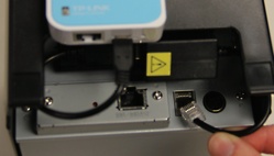 Le Star WiFi Power Pack connecté au port tiroir-caisse de l'imprimante-ticket